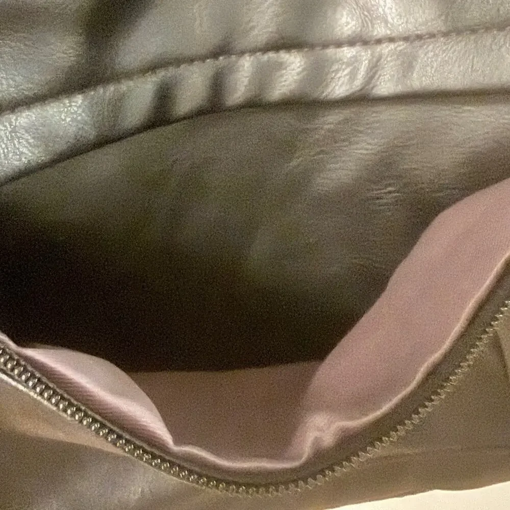 Black Leather Modern + Chic Bag backpack EUC. Lined w/purple. Looks New!